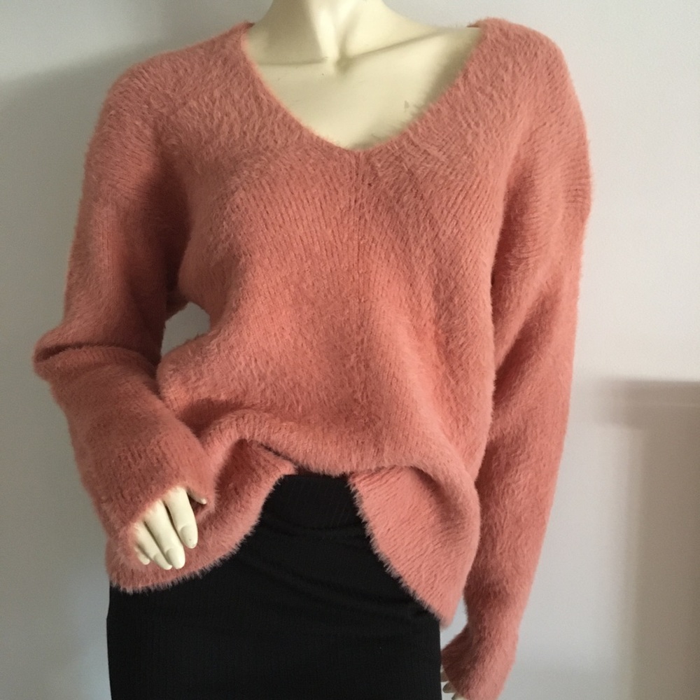 Pink long sleeved fuzzy v-neck sweater with drop shoulder size medium